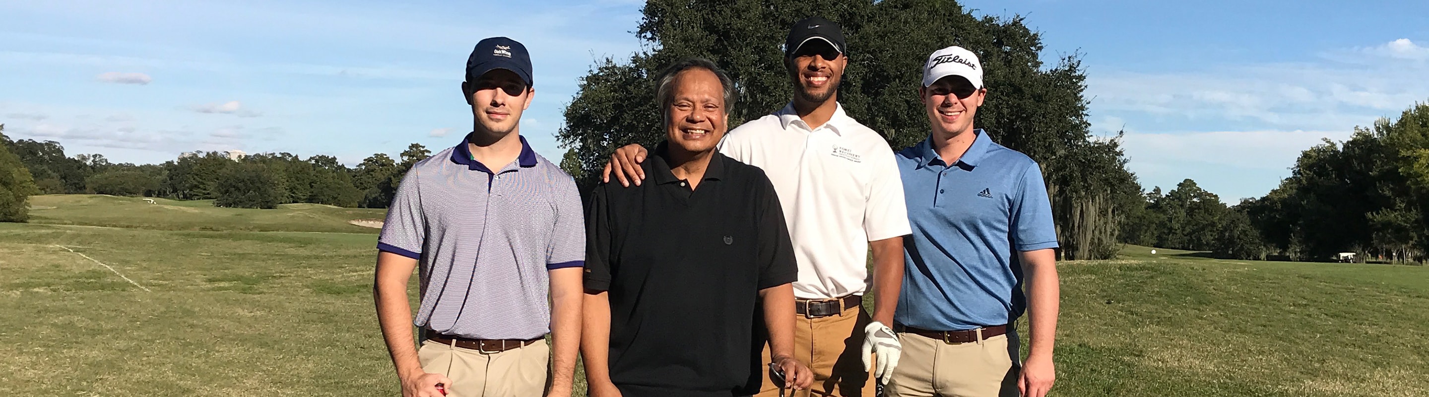 Loyola Law alumni at a golf tournament