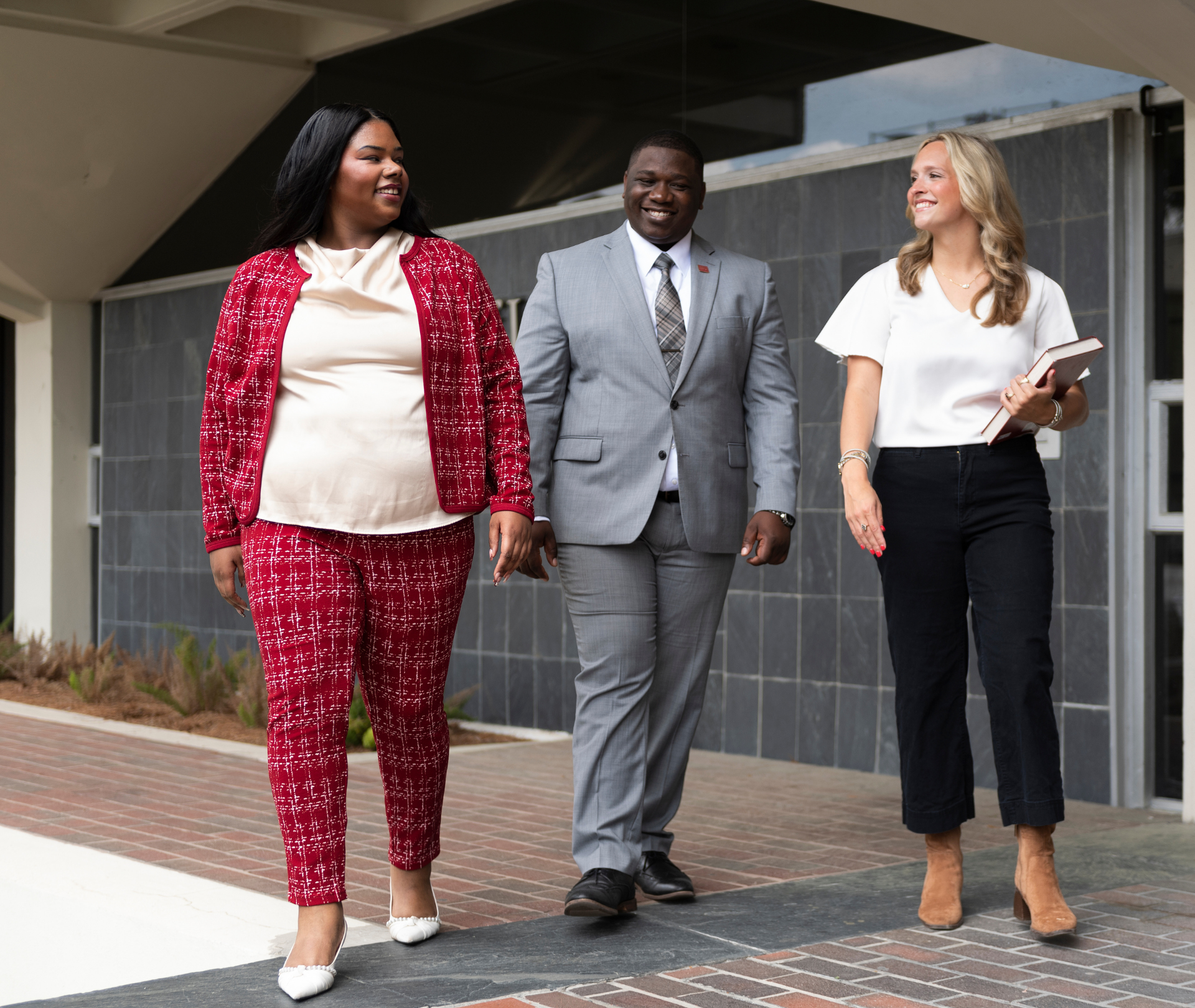 Students walk outside Loyola University New Orleans College of Law.