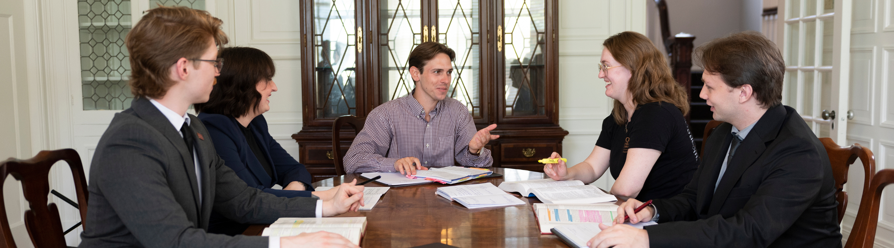 Students studying around a table.